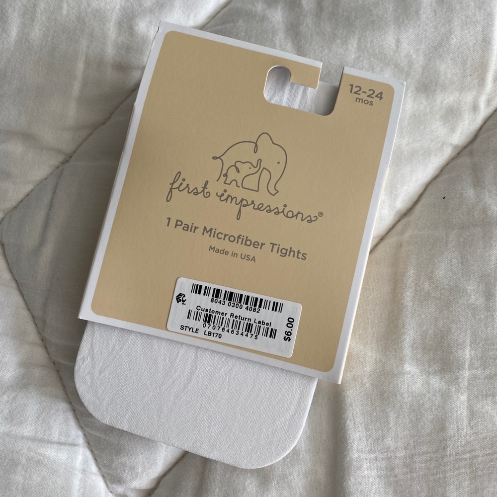 First impressions white tights, NWT. Size 12-24mo